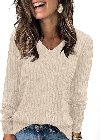 ZOFIA ATELIER beige ribbed V-neck long sleeve t-shirt with a 3D effect stripe pattern.