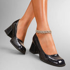 ZOFIA ATELIER black croc-embossed square toe chunky heel pumps with a diamond anklet.