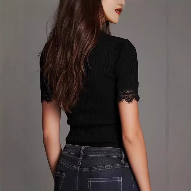 ZOFIA ATELIER black short-sleeved crochet t-shirt with lace trim on sleeves and neckline. Polyester.