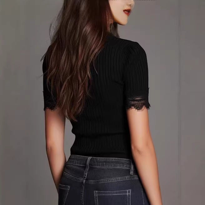 ZOFIA ATELIER black short-sleeved crochet t-shirt with lace trim on sleeves and neckline. Polyester.