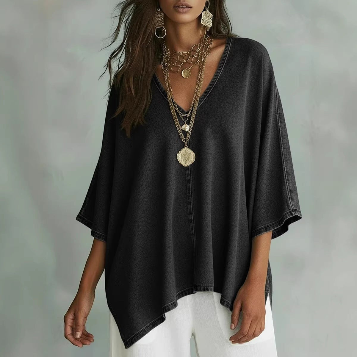 ZOFIA ATELIER black washed-out denim tunic blouse with V-neck and batwing sleeves, relaxed fit.