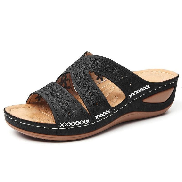ZOFIA ATELIER black embroidered wedge sandals with fish mouth toe and artificial PU upper.