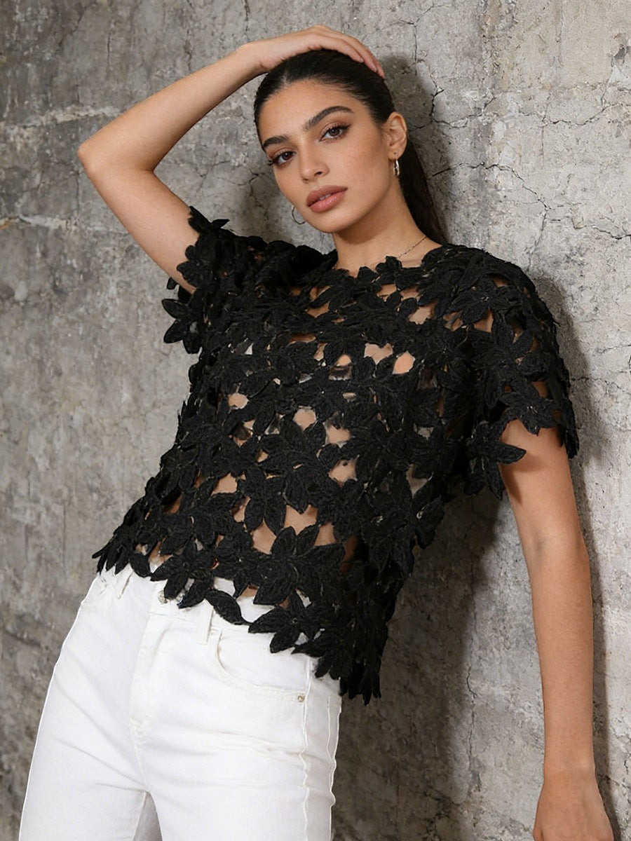 ZOFIA ATELIER black floral lace short sleeve cropped top with round neckline.