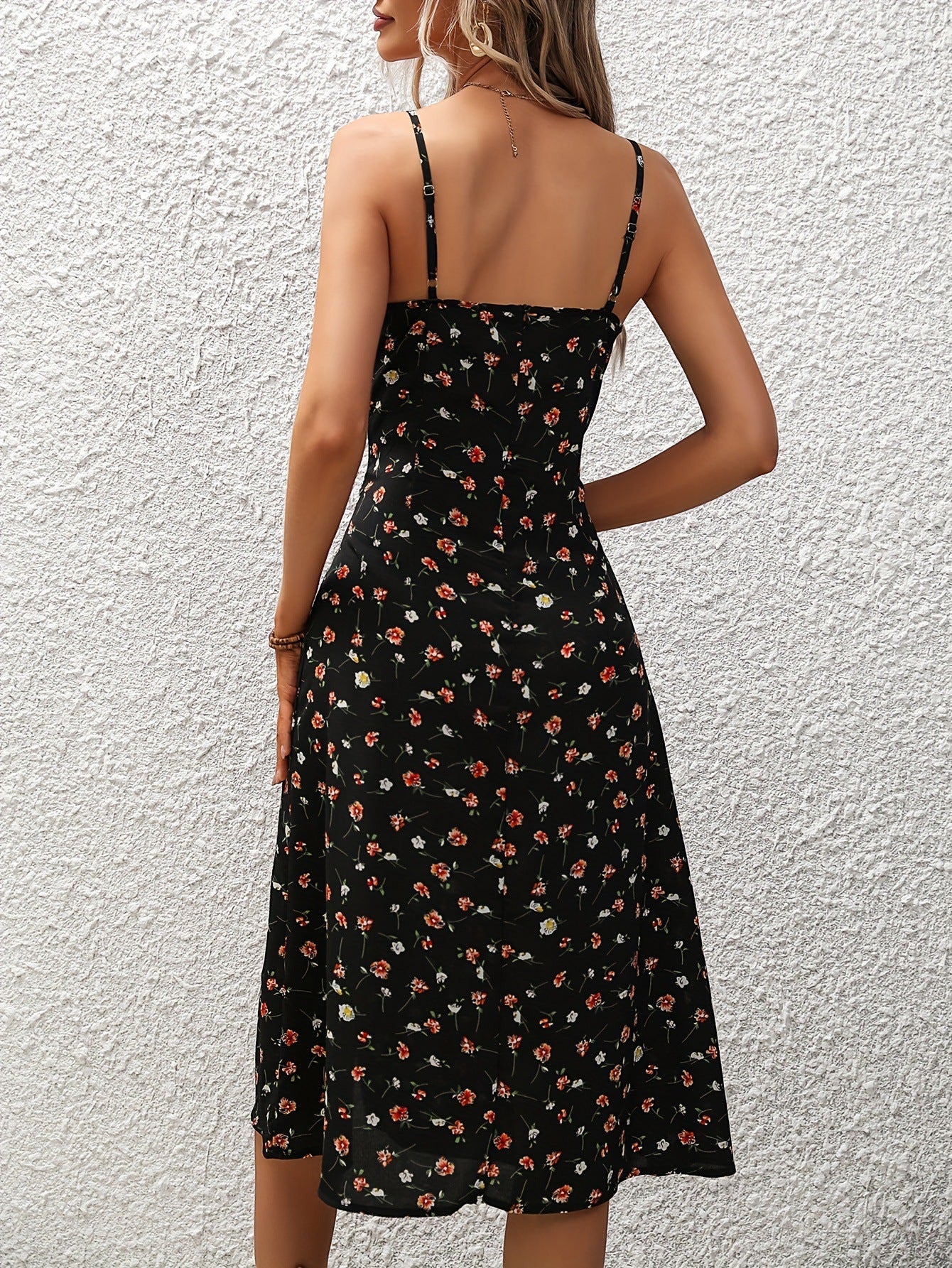 ZOFIA ATELIER black polyester midi dress with a red and white floral print and adjustable spaghetti straps.