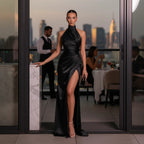 ZOFIA ATELIER black satin halter long dress with a high slit and draped detailing, perfect for evening events.