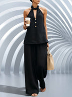 ZOFIA ATELIER black polyester V-neck halter top with gold buttons and wide-leg trousers