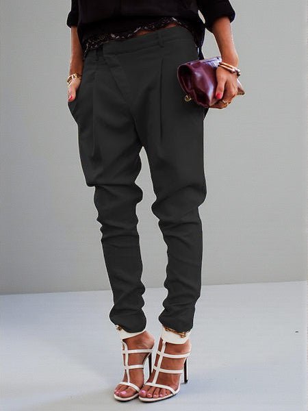 ZOFIA ATELIER black polyester blend high waist harem pants with a tailored fit and cuffed ankles.