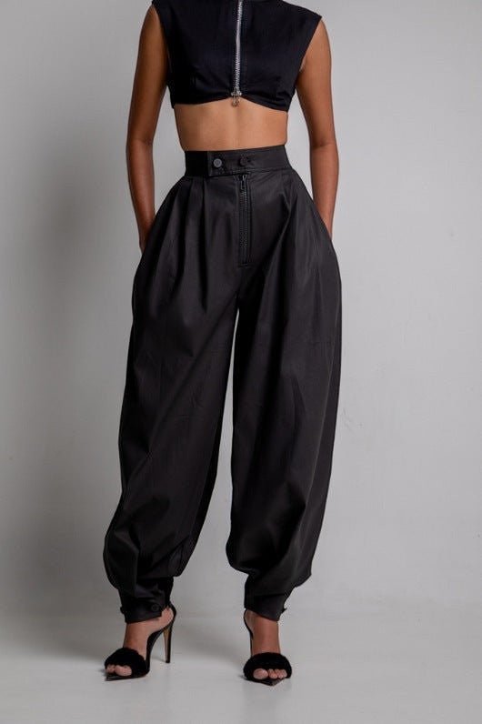 ZOFIA ATELIER black high waist loose polyester jeans with ankle ties and zipper fly.