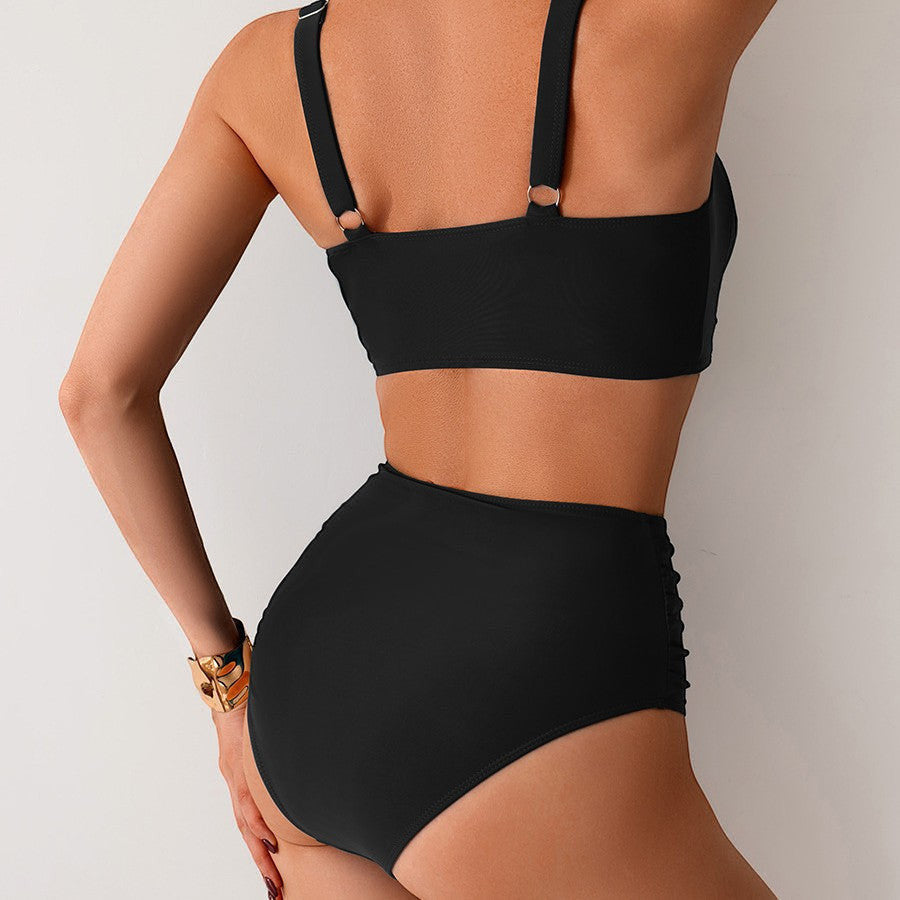 ZOFIA ATELIER black high-waist swimsuit with ruched sides and adjustable straps. Made of nylon and spandex.