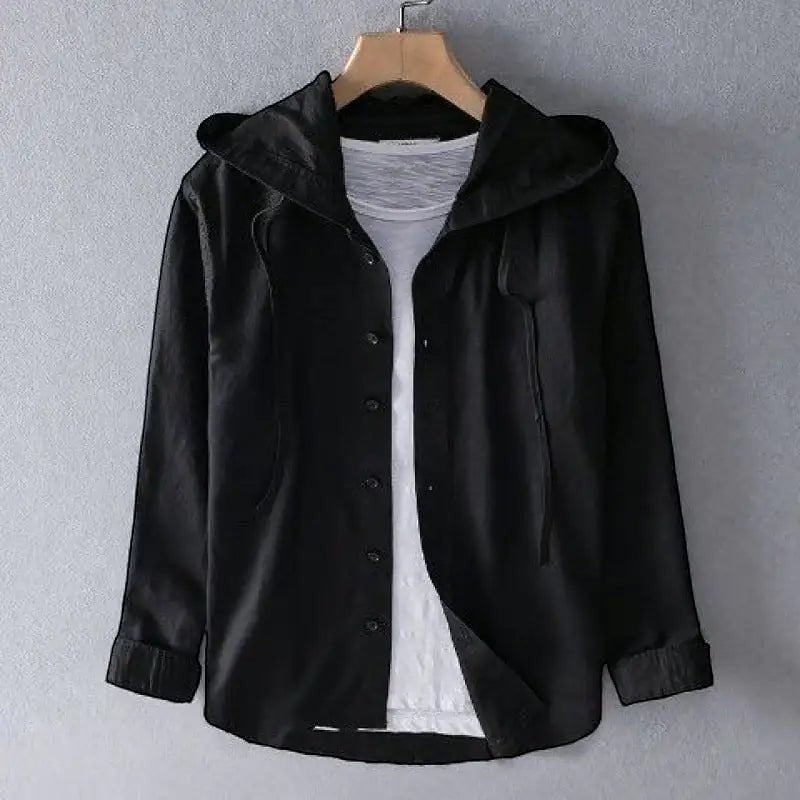 ZOFIA ATELIER DANUTA black hooded blouse with white t-shirt underneath, long sleeves, button-up front, and relaxed fit.