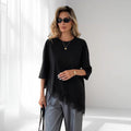 ZOFIA ATELIER black cotton loose fit top with delicate lace-panel hem and short sleeves.