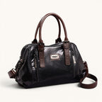 ZOFIA ATELIER black soft leather messenger bag with brown strap and handles, medium size with zipper closure.