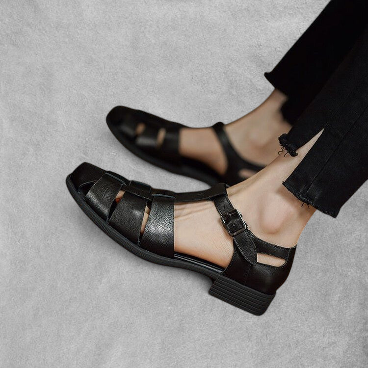 ZOFIA ATELIER black genuine leather retro Roman sandals with buckle strap and chunky sole.
