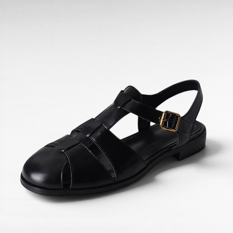 ZOFIA ATELIER black leather retro Roman sandals with hollowed design and gold buckle.