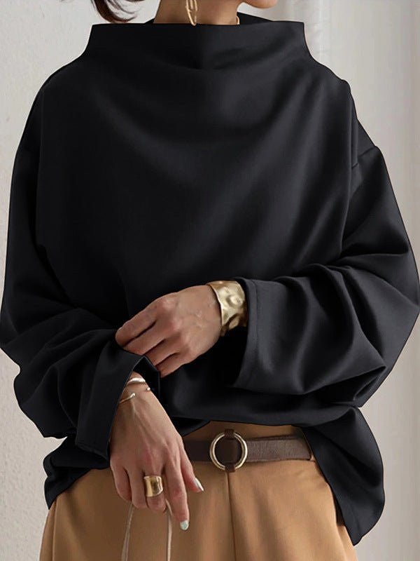 ZOFIA ATELIER black loose-fit polyester sweater with a mock neck and wide sleeves.