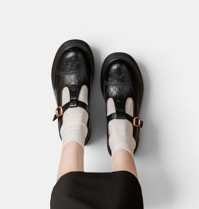 ZOFIA ATELIER black PU vintage Mary Jane shoes with buckle strap and short stout heel.