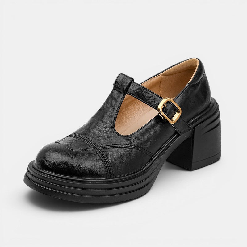 ZOFIA ATELIER black PU vintage Mary Jane shoes with a T-strap, gold buckle, round toe, and thick platform sole.