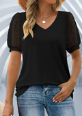 ZOFIA ATELIER black mesh puff sleeve blouse with V-neck and polka dot detail on sleeves.