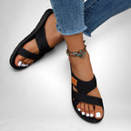 ZOFIA ATELIER black mesh fabric slip-on slippers with criss-cross straps and PVC sole. Casual footwear.
