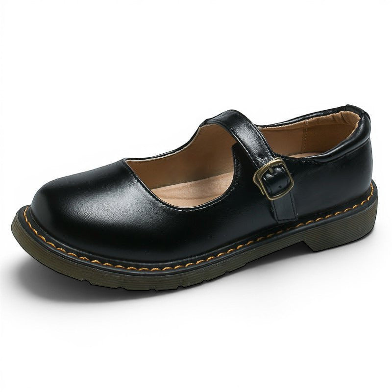 ZOFIA ATELIER black microfiber low-cut flat shoes with buckle closure and rubber sole.
