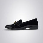 ZOFIA ATELIER black patent leather square toe loafers with gold buckle detail.