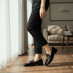ZOFIA ATELIER black patent leather square toe loafers with gold buckle detail, flat sole, slip-on style.
