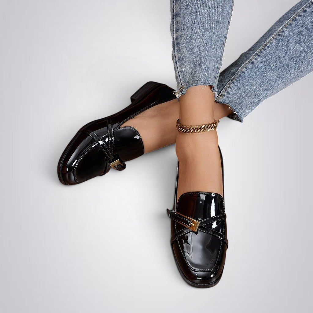 ZOFIA ATELIER black patent leather square toe loafers with buckle detail. Flat sole, slip-on style.