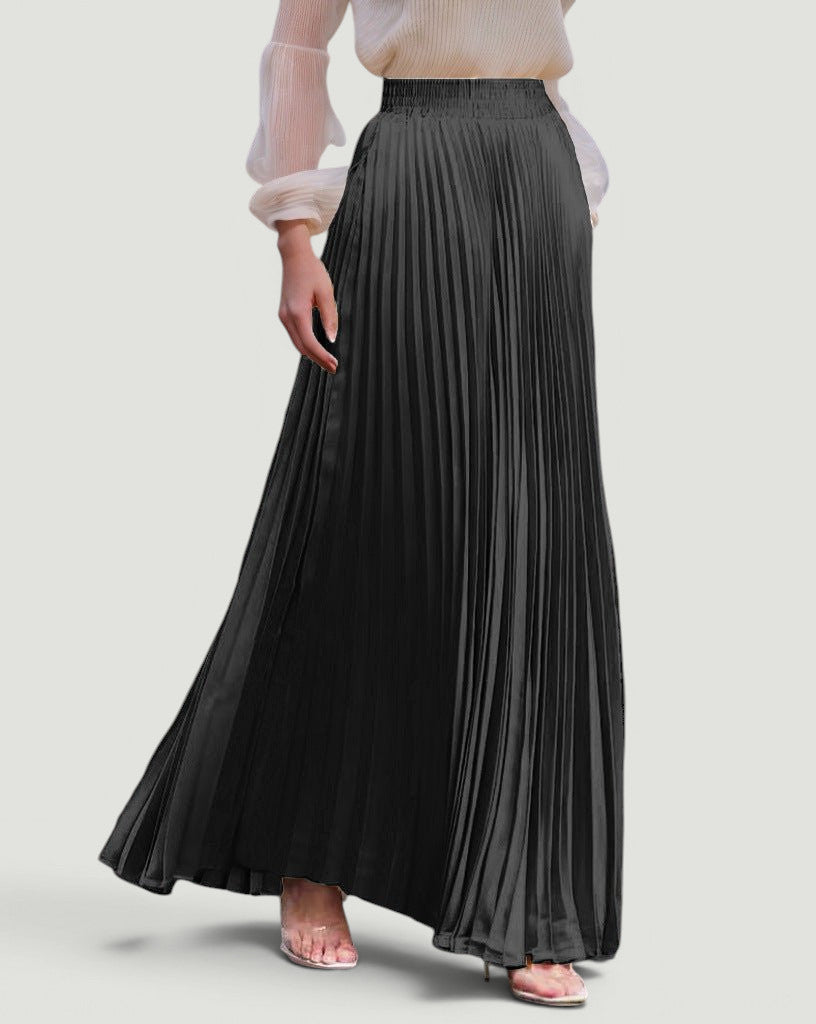 ZOFIA ATELIER KRYSTYNA black polyester high-waisted pleated maxi skirt with slight elasticity.