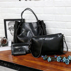 ZOFIA ATELIER black PU leather 3-piece bag set with medium bucket tote, crossbody bag, and wallet. Retro-inspired design.
