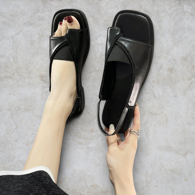 ZOFIA ATELIER black PU square toe casual sandals with elastic slingback strap and rubber sole.