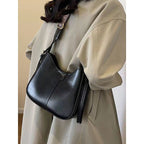 ZOFIA ATELIER black retro crossbody bag with patchwork stitching and adjustable strap, made of PU leather.