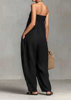 ZOFIA ATELIER black ruched strapless polyester jumpsuit with pockets and straight legs