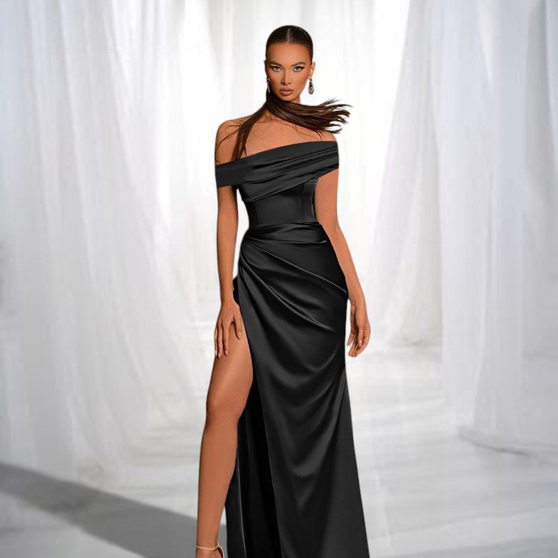 ZOFIA ATELIER black satin off-the-shoulder dress with high waist and dramatic thigh-high slit.