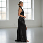 ZOFIA ATELIER black satin halter long dress with a high slit, sleeveless, perfect for evening parties.
