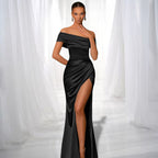 ZOFIA ATELIER black satin off-the-shoulder maxi dress with a high slit and draped detailing.