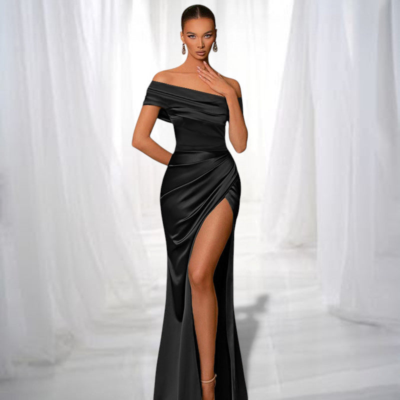 ZOFIA ATELIER black satin off-the-shoulder maxi dress with a high slit and draped detailing.