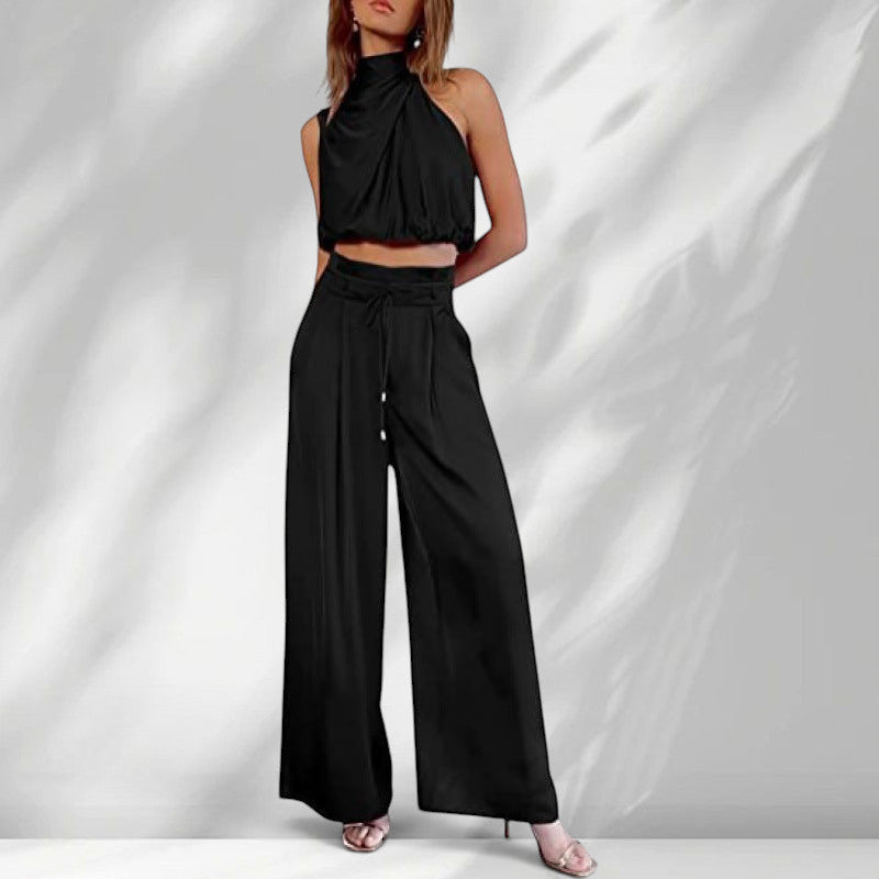 ZOFIA ATELIER black sleeveless halter crop top and wide-leg trousers set made of regenerated cellulose fiber.