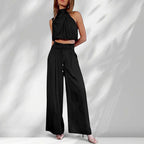 ZOFIA ATELIER black sleeveless halter crop top and wide-leg trousers set made of regenerated cellulose fiber.