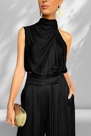 ZOFIA ATELIER black sleeveless draped mock neck top with wide-leg trousers, featuring a midriff-baring design.