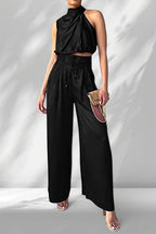 ZOFIA ATELIER black sleeveless halter crop top with wide-leg trousers, made of regenerated cellulose fiber.
