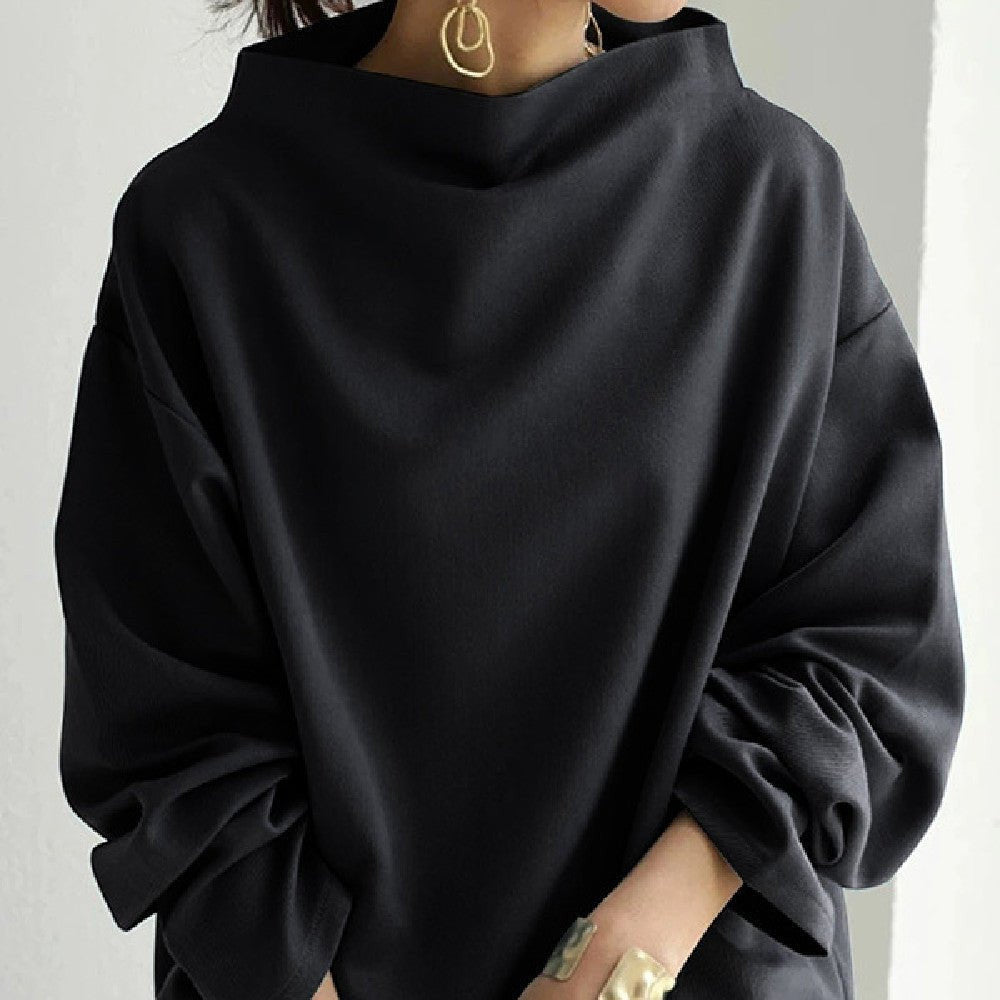 ZOFIA ATELIER loose black polyester sweater with high neckline and gathered sleeves.