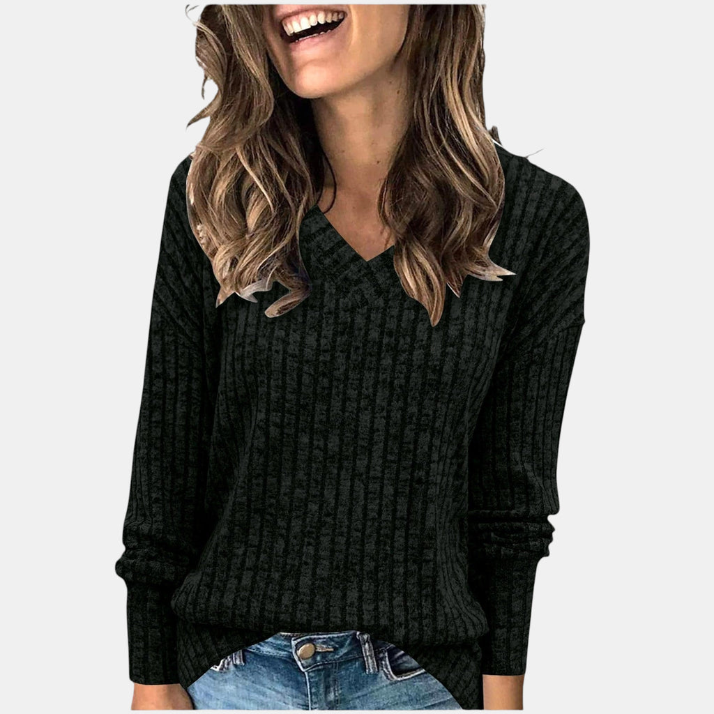 ZOFIA ATELIER black long sleeve V-neck t-shirt with a ribbed texture and a 3D stripe effect.
