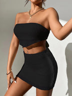 ZOFIA ATELIER black waffle knit two-piece set with strapless bandeau top and mini skirt.