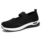 ZOFIA ATELIER black lightweight knit walking shoes with white sole and adjustable strap.