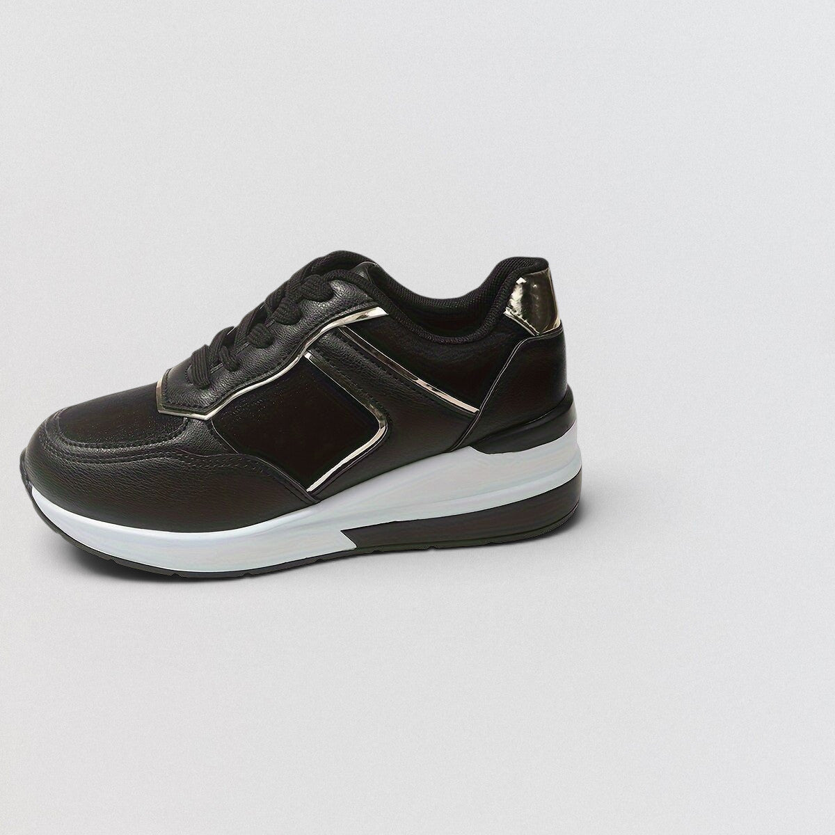 ZOFIA ATELIER black PU leather wedge sneakers with white sole and silver accents. Round toe, lace-up front.