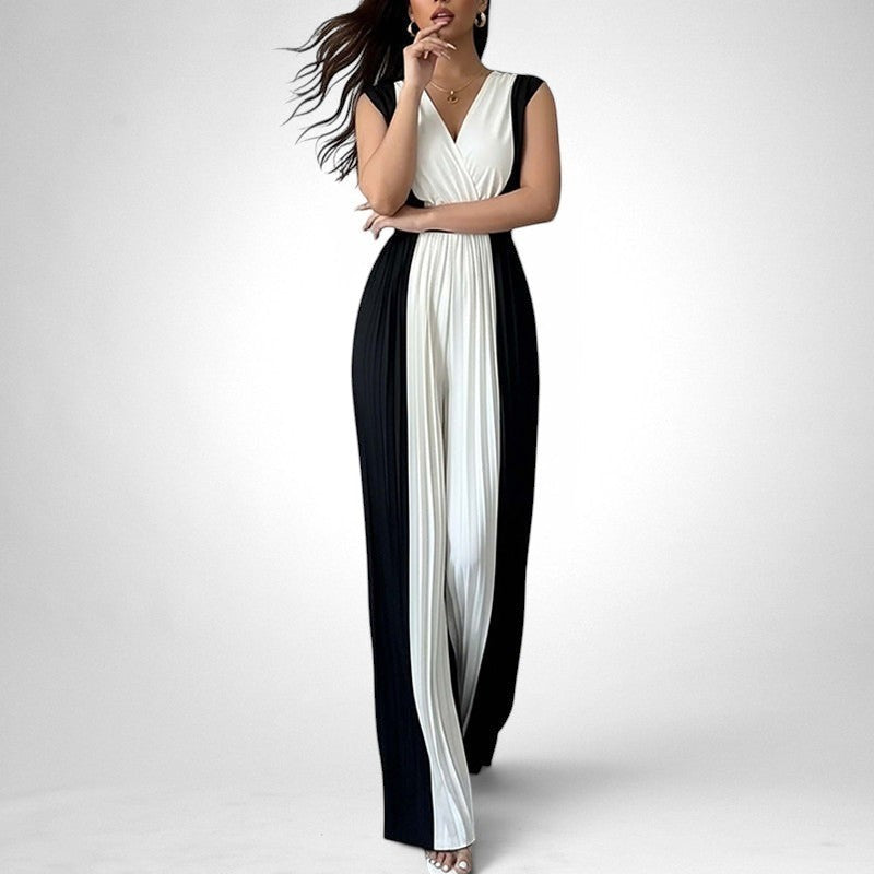 ZOFIA ATELIER black and white colorblock pleated wide-leg jumpsuit with V-neckline and sleeveless design.