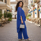 ZOFIA ATELIER blue flowy chiffon ensemble with wide-leg pants and a loose-fitting top.