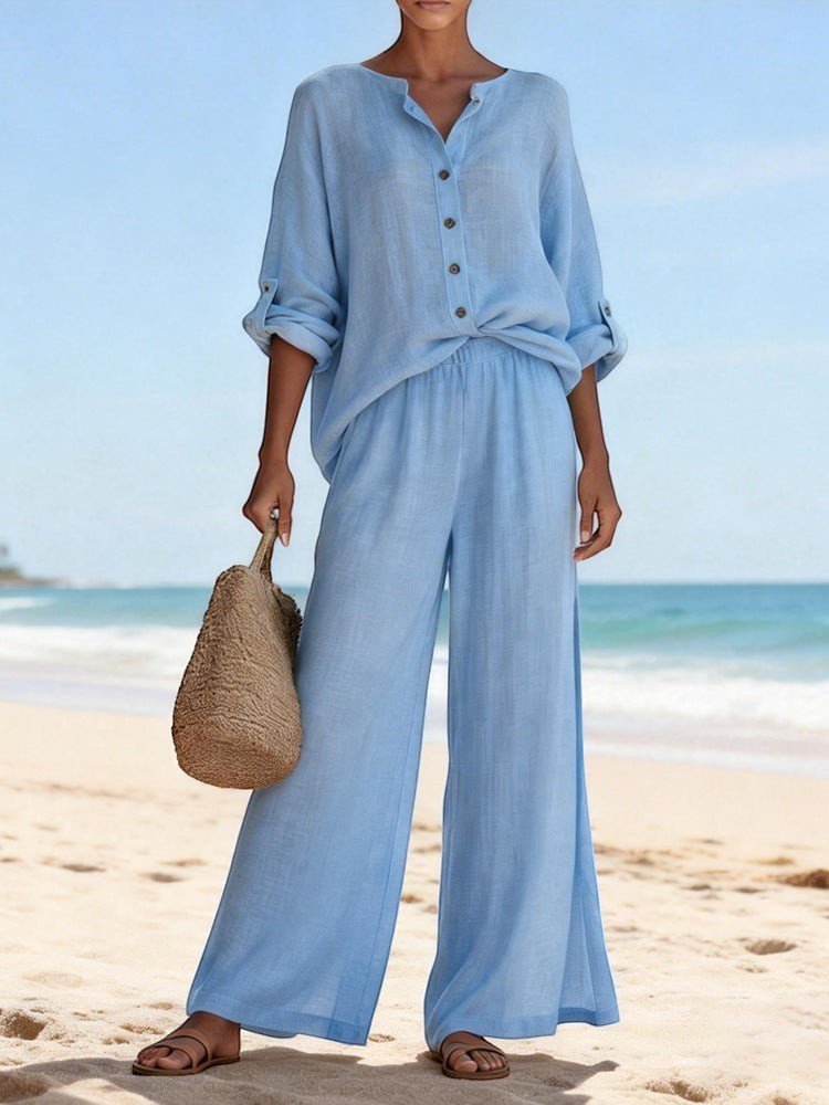 ZOFIA ATELIER light blue cotton lounge set with V-neck long sleeve top and wide-leg pants on beach.