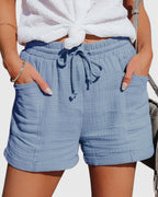 ZOFIA ATELIER light blue crinkled cotton blend shorts with drawstring waist and cuffed hem
