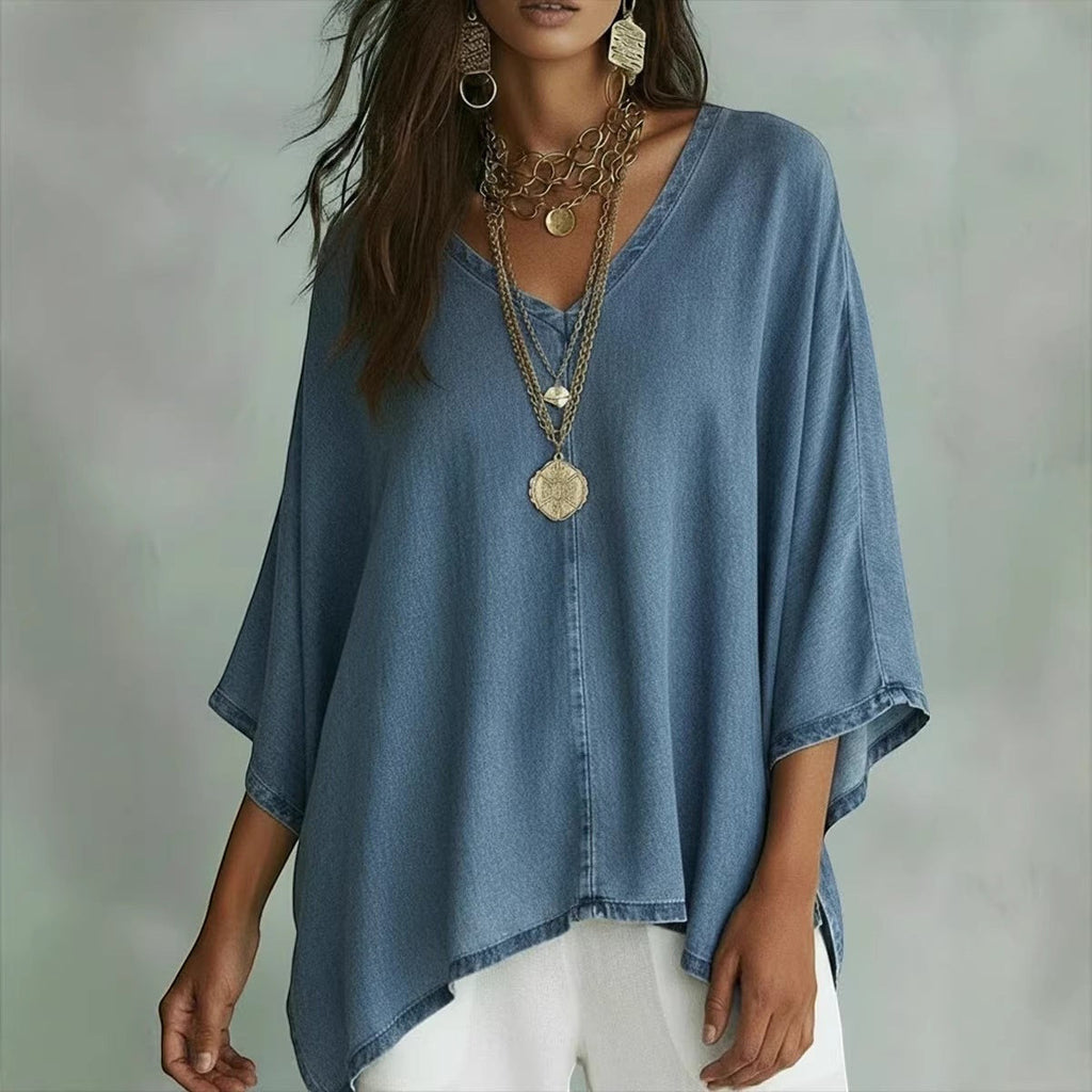 ZOFIA ATELIER blue washed-out denim tunic blouse with V-neck and batwing sleeves, relaxed fit.